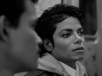 Movie still from “Michael Jackson - Bad” (1987), directed by Martin Scorsese – Close Up shot, Over the shoulder angle