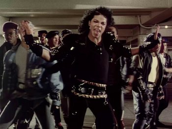 Movie still from “Michael Jackson - Bad” (1987), directed by Martin Scorsese – Medium shot, Low angle