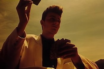 Movie still from “Gipsy Kings - Bamboléo” (1987), directed by David Fincher – Medium shot, Low angle