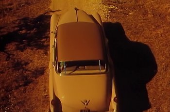Movie still from “Gipsy Kings - Bamboléo” (1987), directed by David Fincher – Extreme Wide shot, Overhead angle