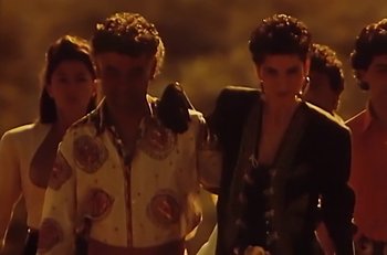 Movie still from “Gipsy Kings - Bamboléo” (1987), directed by David Fincher – Medium shot, Low angle