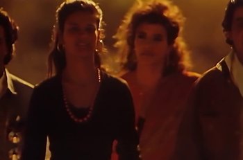 Movie still from “Gipsy Kings - Bamboléo” (1987), directed by David Fincher – Medium shot, Low angle