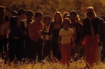 Movie still from “Gipsy Kings - Bamboléo” (1987), directed by David Fincher – Wide shot, High angle