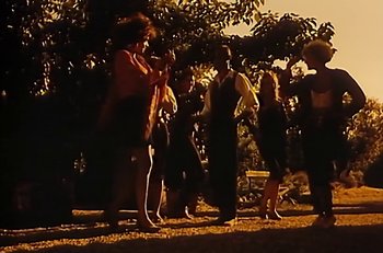 Movie still from “Gipsy Kings - Bamboléo” (1987), directed by David Fincher – Wide shot, Low angle