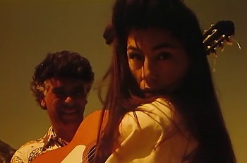 Movie still from “Gipsy Kings - Bamboléo” (1987), directed by David Fincher – Extreme Close Up shot, Low angle