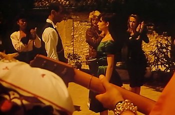 Movie still from “Gipsy Kings - Bamboléo” (1987), directed by David Fincher – Medium shot, Over the shoulder angle