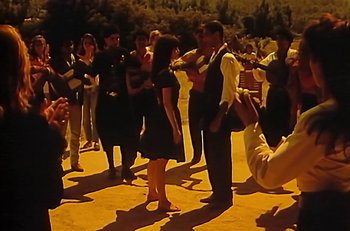 Movie still from “Gipsy Kings - Bamboléo” (1987), directed by David Fincher – Wide shot, High angle