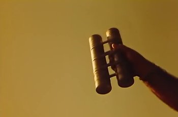 Movie still from “Gipsy Kings - Bamboléo” (1987), directed by David Fincher – Extreme Close Up shot, Low angle