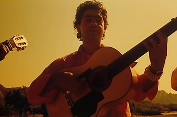 Movie still from “Gipsy Kings - Bamboléo” (1987), directed by David Fincher – Close Up shot, Low angle