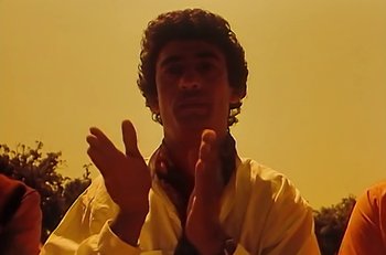 Movie still from “Gipsy Kings - Bamboléo” (1987), directed by David Fincher – Close Up shot, Low angle