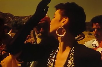 Movie still from “Gipsy Kings - Bamboléo” (1987), directed by David Fincher – Close Up shot, Low angle