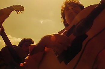 Movie still from “Gipsy Kings - Bamboléo” (1987), directed by David Fincher – Extreme Close Up shot, Low angle