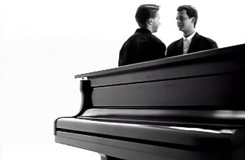 Movie still from “Johnny Hates Jazz - Shattered Dreams” (1987), directed by David Fincher – Medium shot, Low angle