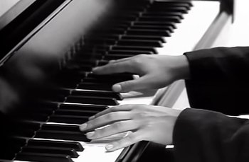 Movie still from “Johnny Hates Jazz - Shattered Dreams” (1987), directed by David Fincher – Extreme Close Up shot, Low angle