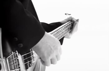 Movie still from “Johnny Hates Jazz - Shattered Dreams” (1987), directed by David Fincher – Extreme Close Up shot, Low angle