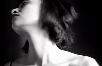 Movie still from “Johnny Hates Jazz - Shattered Dreams” (1987), directed by David Fincher – Extreme Close Up shot, Low angle