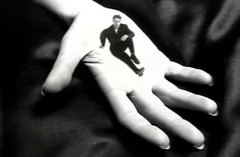 Movie still from “Johnny Hates Jazz - Shattered Dreams” (1987), directed by David Fincher – Extreme Close Up shot, High angle