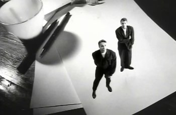 Movie still from “Johnny Hates Jazz - Shattered Dreams” (1987), directed by David Fincher – Wide shot, Low angle