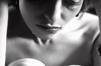 Movie still from “Johnny Hates Jazz - Shattered Dreams” (1987), directed by David Fincher – Extreme Close Up shot, Low angle