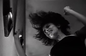 Movie still from “Johnny Hates Jazz - Shattered Dreams” (1987), directed by David Fincher – Close Up shot, Low angle