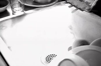 Movie still from “Johnny Hates Jazz - Shattered Dreams” (1987), directed by David Fincher – Extreme Close Up shot, Overhead angle