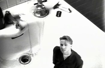 Movie still from “Johnny Hates Jazz - Shattered Dreams” (1987), directed by David Fincher – Extreme Close Up shot, Overhead angle