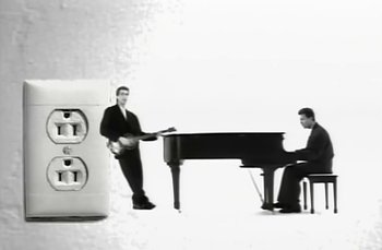 Movie still from “Johnny Hates Jazz - Shattered Dreams” (1987), directed by David Fincher – Wide shot, High angle