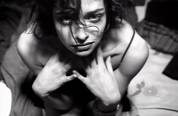 Movie still from “Johnny Hates Jazz - Shattered Dreams” (1987), directed by David Fincher – Extreme Close Up shot, Low angle