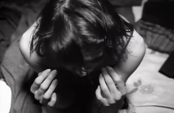 Movie still from “Johnny Hates Jazz - Shattered Dreams” (1987), directed by David Fincher – Extreme Close Up shot, Low angle
