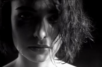 Movie still from “Johnny Hates Jazz - Shattered Dreams” (1987), directed by David Fincher – Extreme Close Up shot, Low angle