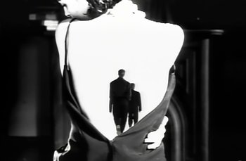 Movie still from “Johnny Hates Jazz - Shattered Dreams” (1987), directed by David Fincher – Medium shot, Low angle