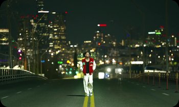 Movie still from “Oblé Reed - WESTON” (2023), directed by Nash Pearson – Wide shot, Low angle
