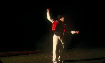 Movie still from “Oblé Reed - WESTON” (2023), directed by Nash Pearson – Medium shot, Low angle
