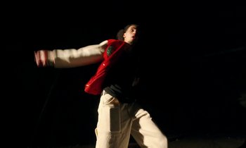 Movie still from “Oblé Reed - WESTON” (2023), directed by Nash Pearson – Medium shot, Low angle