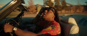 Movie still from “Quavo x Takeoff - Hotel Lobby” (2022), directed by Keemotion – Close Up shot, Low angle
