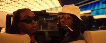 Movie still from “Quavo x Takeoff - Hotel Lobby” (2022), directed by Keemotion – Close Up shot, Low angle