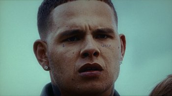 Movie still from “slowthai - Yum” (2023), directed by Owls – Close Up shot, Low angle