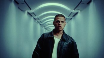 Movie still from “slowthai - Yum” (2023), directed by Owls – Medium shot, Low angle
