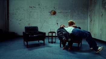 Movie still from “slowthai - Yum” (2023), directed by Owls – Wide shot, Overhead angle