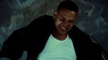 Movie still from “slowthai - Yum” (2023), directed by Owls – Close Up shot, Overhead angle