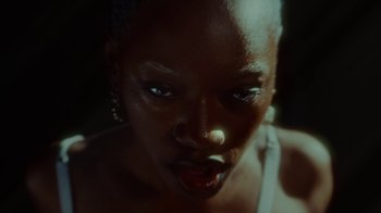 Movie still from “slowthai - Yum” (2023), directed by Owls – Extreme Close Up shot, Low angle