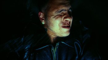 Movie still from “slowthai - Yum” (2023), directed by Owls – Extreme Close Up shot, Low angle