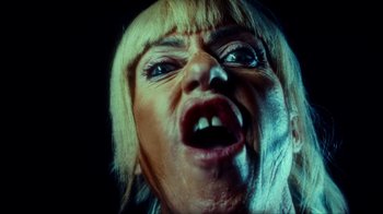 Movie still from “slowthai - Yum” (2023), directed by Owls – Extreme Close Up shot, Low angle