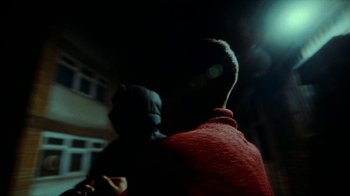 Movie still from “slowthai - Yum” (2023), directed by Owls – Medium shot, Low angle
