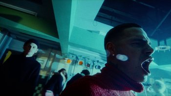 Movie still from “slowthai - Yum” (2023), directed by Owls – Close Up shot, Low angle