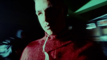 Movie still from “slowthai - Yum” (2023), directed by Owls – Extreme Close Up shot, Low angle