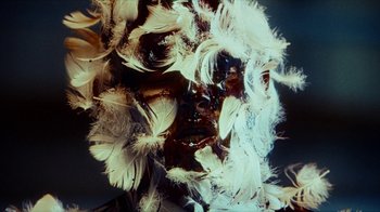 Movie still from “slowthai - Yum” (2023), directed by Owls – Extreme Close Up shot, Overhead angle