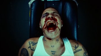 Movie still from “slowthai - Yum” (2023), directed by Owls – Close Up shot, Overhead angle