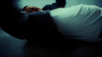 Movie still from “slowthai - Yum” (2023), directed by Owls – Extreme Close Up shot, Overhead angle