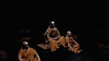 Movie still from “Travis Scott - FE!N” (2024), directed by Gabriel Moses – Medium shot, Low angle